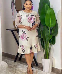Elegant cream-colored knee-length dress