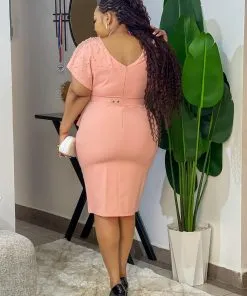 Alternative view of Stylish peach-colored knee-length dress