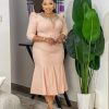 Stunning light peach-colored midi dress